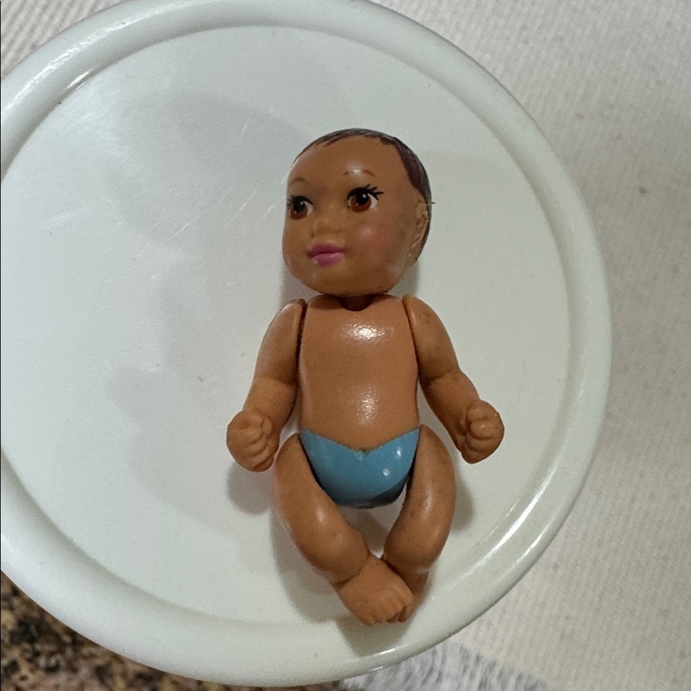 The product is a baby doll from the "Happy Family" line was a part of the Barbie - Picture 5 of 5